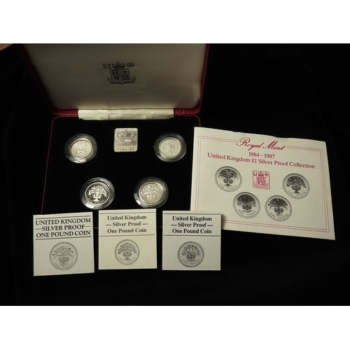 517 - One Pound Silver Proof four coin set 1984 - 1987. FDC cased as issued