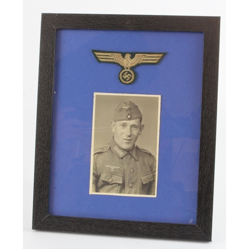 1017 - German Luftwaffe framed airman photo with breast eagle and German framed Army soldiers photo with br... 