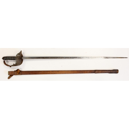 104 - Sword 1897 pattern ERVII Infantry officers dress sword in its leather field scabbard.