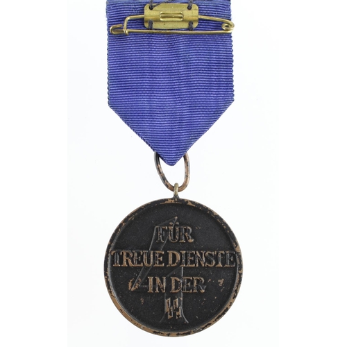 1054 - German SS 4 Year LS & GC medal.