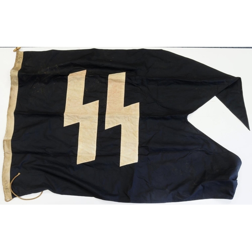 1070 - German SS Flag, stamped Berlin 1943, 5 feet long, service wear.