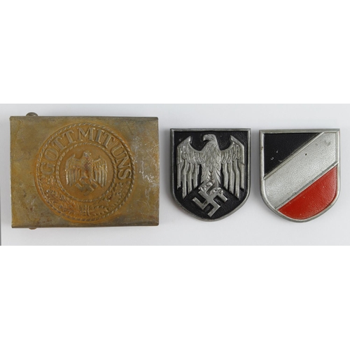 1088 - German Wehrmacht belt buckle and Pith helmet shields.