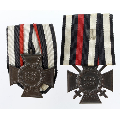 1092 - German WW1 Cross of Honour medals one with swords the other without, both court mounted.