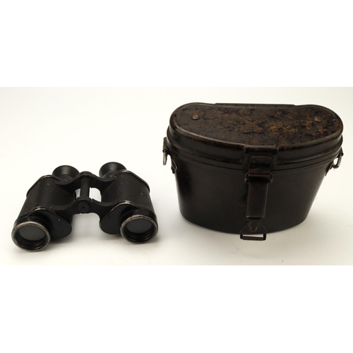 1111 - German WW2 pair of Dinstclass binoculars in their black bakelite case.