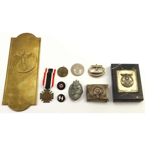 1128 - Small mixed lot of German 3rd Reich items including badges, medals, Plaque, etc  (qty)