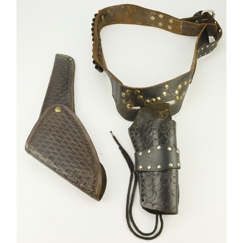 120 - Western holsters - a good long basket weave leather holster, lined out in green baize for a Cold or ... 