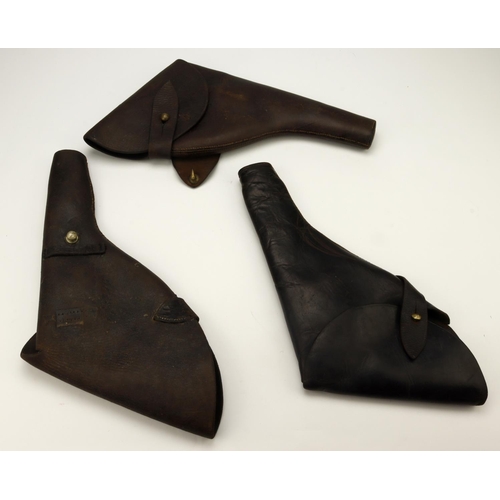 121 - World war i officer’s webley revolver holsters, group of three different types, including one with l... 