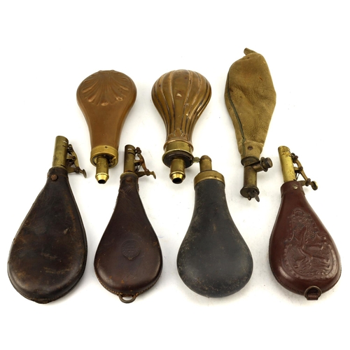 26 - Collection of 19th century leather powder flasks.