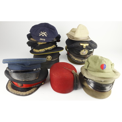 299 - Military headwear mixed group of 13x vintage items, includes a wwii royal navy officer’s peaked cap,... 