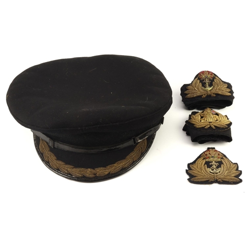 357 - Royal navy world war ii officer’s peaked cap, bullioned leaves to peak, together with a separate bul... 