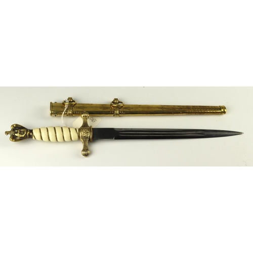 44 - German Kriegsmarine dagger, plain late war blade, with scabbard.