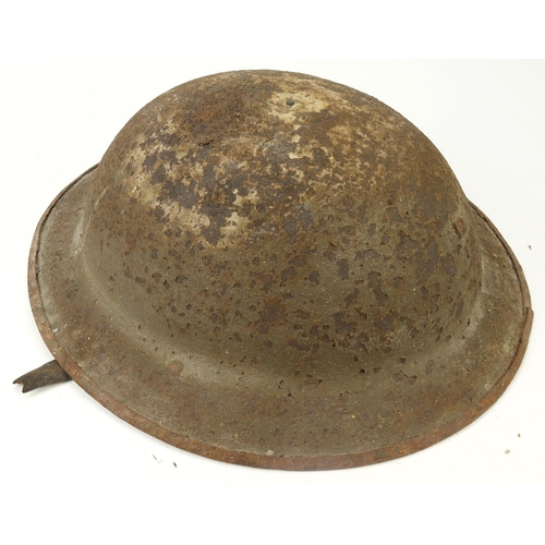 449 - WW1 relic Brodie Helmet with partial liner and chin strap