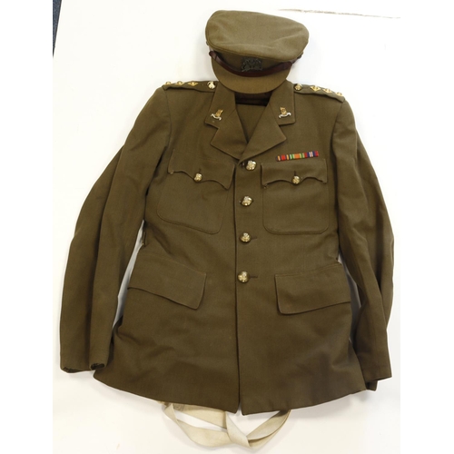 488 - WW2 officers uniform to a captain in the general service corps with jacket trousers hat and Sam brow... 