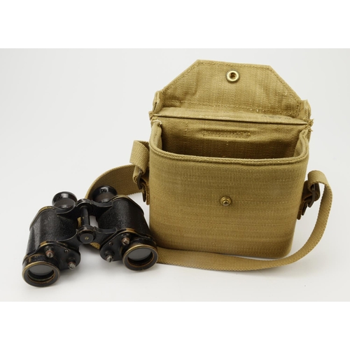 492 - WW2 pair of Kershaw 1944 dated binoculars in their webbing case both in good condition.