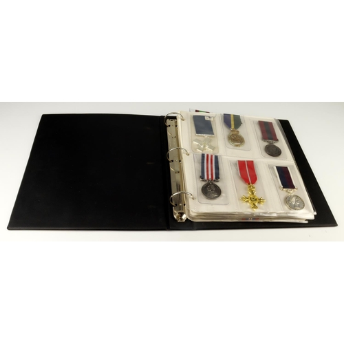 570 - Album of copy or original toned / damaged medals, 30x, inc Gallantry, Victorian etc.