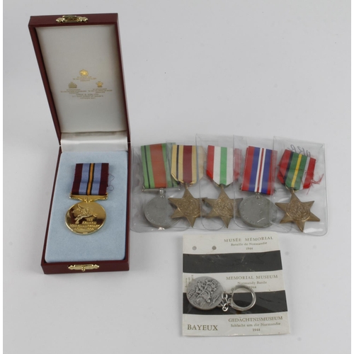 575 - Arnhem Commemoration medal and a selection of mostly replacement WW2 campaign medals.