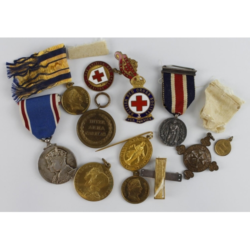 592 - British Red Cross medals for Devon, various, plus 1937 Coronation Medal. BRC 1914-1918 War Medal nam... 