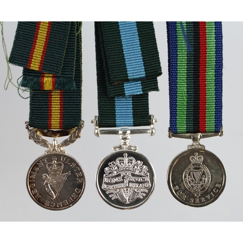 816 - Miniature medals Irish UDR types 3x.