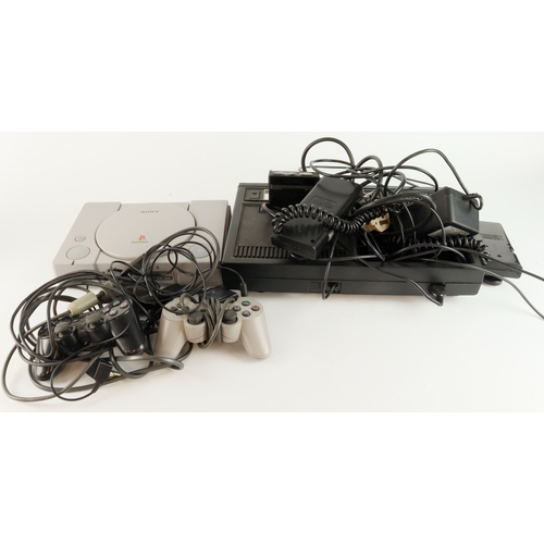 101 - Computer Consoles. Two computer consoles, comprising a Playstation with two controllers & a Coleco V... 