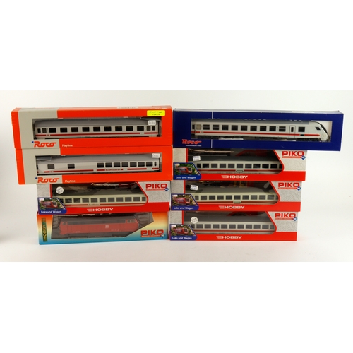 250 - Piko & Roco. A boxed Piko HO gauge German DB Class BR218 Diesel locomotive (57502), together with fo... 