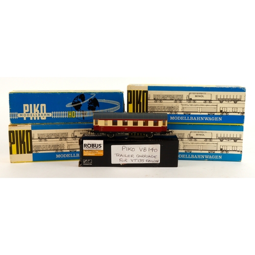 253 - Piko. A boxed Piko HO gauge 6100 Class VT135 MI40 323 DR Railbus, together with three boxed Piko HO ... 