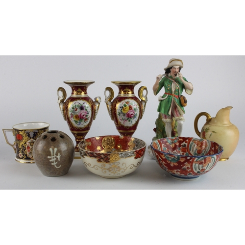 270 - Ceramics. A group of eight various ceramic & porcelain pieces, including a male figure, imari patter... 