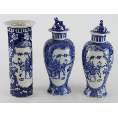 276 - Chinese interest. A pair of chinese vases with lids & another vase, each with Chinese characters to ... 