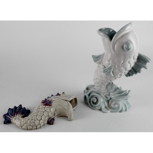 278 - Clarice Cliff. Two Clarice Cliff pottery items, comprising fish wall plaque and fish vase, both with... 
