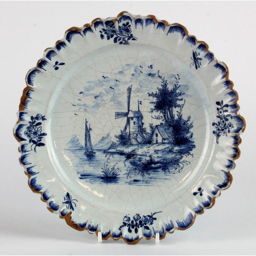 279 - Delft plate, circa 1700, with traditional windmill scene, initials to back for 'Adriaenus Koeks', di... 