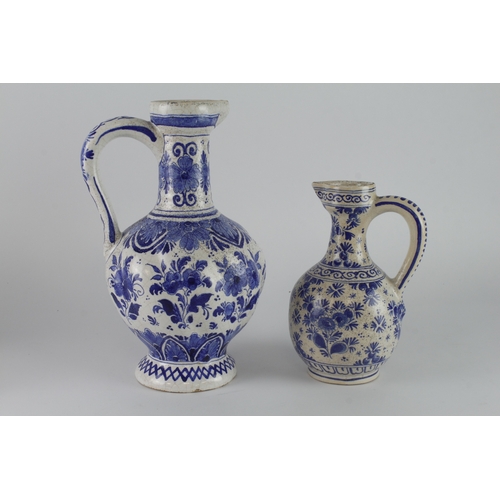 280 - Delft. Two large blue & white jugs / ewers (one marked 'Delft' to base), tallest 30cm approx.