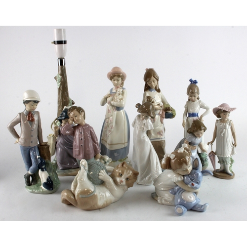 285 - Figures. A collection of eleven various porcelain figures, including Nao, Nadal, etc. (including a l... 