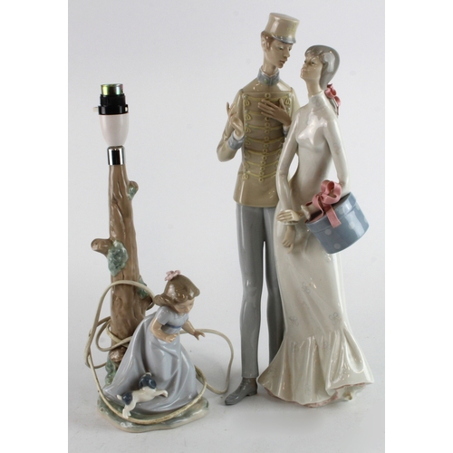 299 - Lladro. Two Lladro pieces comprising lamp base 'depicting a girl with small dog, height 37cm approx.... 