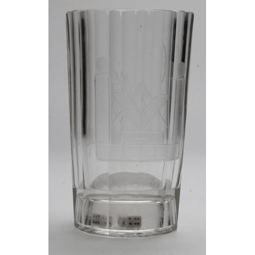 300 - Masonic interest. Glass tumbler etched with Masonic symbols, three dice incorporated into hollow bas... 