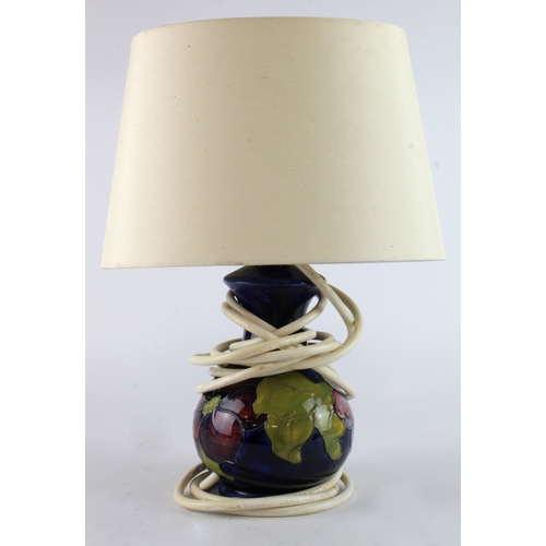 310 - Moorcroft Clematis pattern table lamp, with shade, makers mark to base, total height cm approx. (sol... 