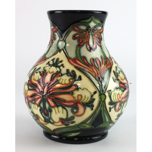 314 - Moorcroft Honeysuckle pattern vase, makers marks to base, height 16cm approx.