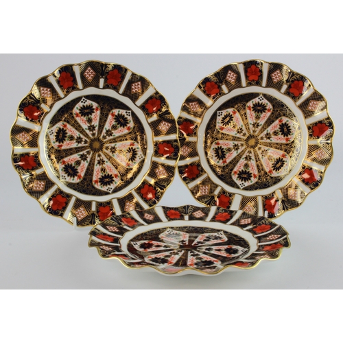 332 - Royal Crown Derby. Three Royal Crown Derby 'Old Imari' pattern porcelain fluted plates, makers marks... 