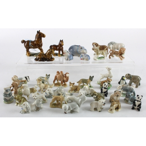 359 - Wade. A collection of approximately thirty-eight various Wade figures, including  pandas, dogs, lion... 