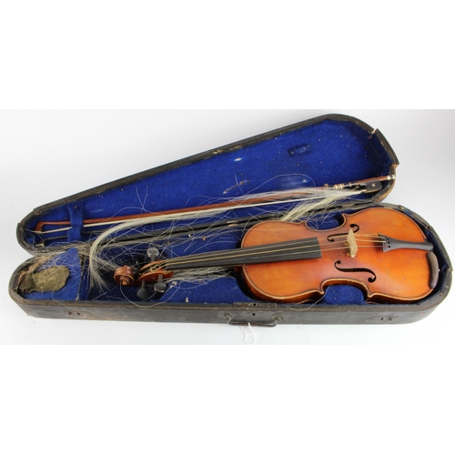 415 - Violin. A copy of an Antonius Stradivarius violin, with two bows (one stamped 'Tourte'), contained i... 