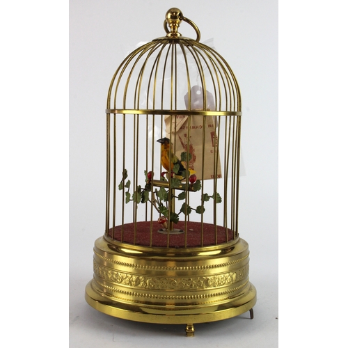 451 - Automaton. A gilt brass bird cage automaton with singing bird within, not working, height 28cm appro... 