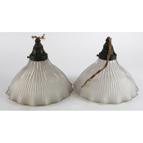 486 - Lamps. A pair of glass holophane pendant lights, diameter 24cm approx., Taken from the Alexandra Pal... 