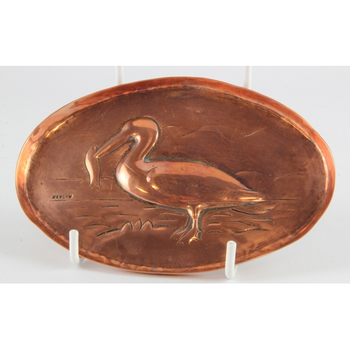 499 - Newlyn copper dish, depicting a sea bird, stamped 'Newlyn', 14cm x 9.5cm approx.