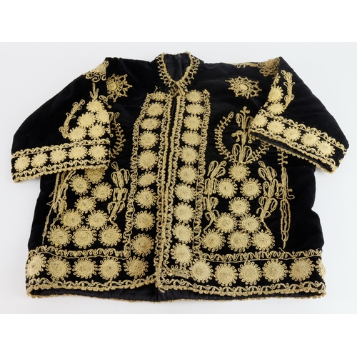 527 - Victorian ladies black velvet jacket, with ornate embroidered decoration