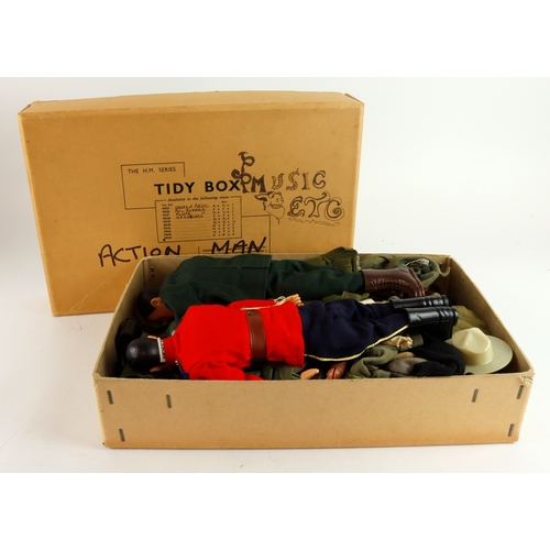 81 - Action Man. Box containing a selection of clothing and various accessories. Along with two Action Ma... 