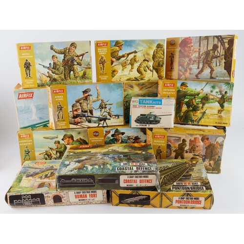 83 - Airfix. A collection of fourteen boxed mostly Airfix model kits, including Pontoon Bridge Assault Se... 