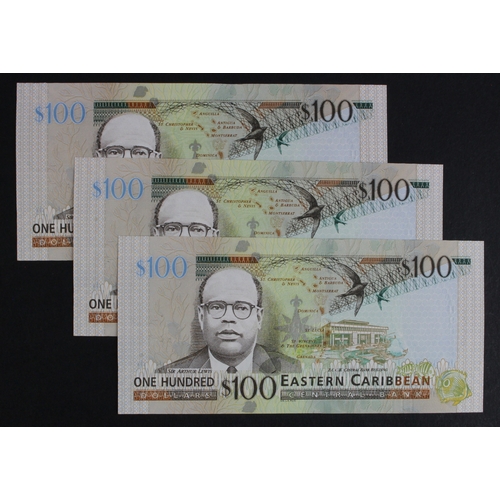 554 - East Caribbean 100 Dollars issued 2012, a consecutively numbered run, serial VU986862 - VU986864 (BN... 