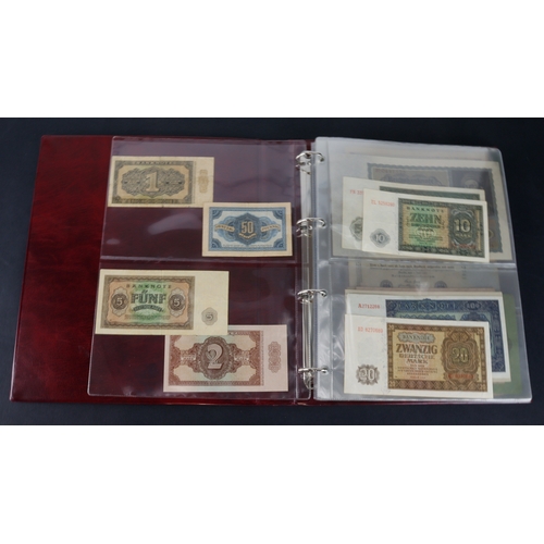 594 - Germany (67), a collection in album including German Democratic Republic 50 Pfennig to 100 Mark date... 