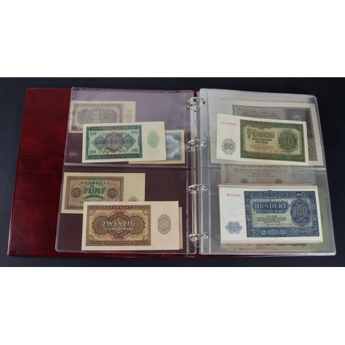 594 - Germany (67), a collection in album including German Democratic Republic 50 Pfennig to 100 Mark date... 