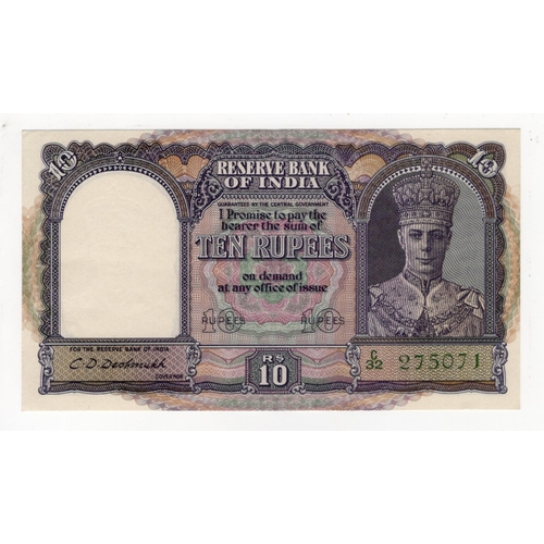 621 - India 10 Rupees issued 1943, King George VI portrait at right, signed C.D. Deshmukh, serial C/32 275... 