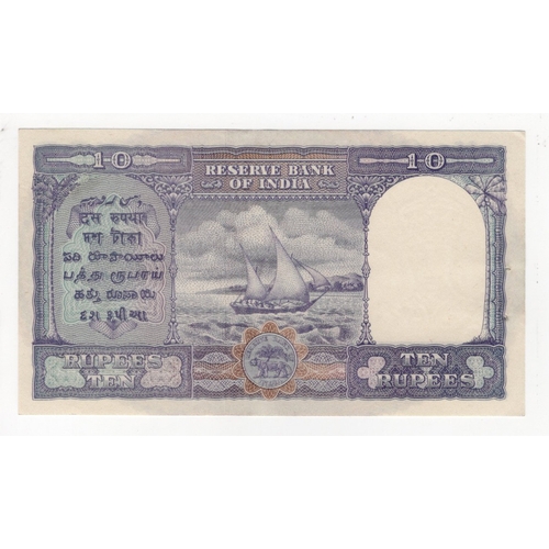 621 - India 10 Rupees issued 1943, King George VI portrait at right, signed C.D. Deshmukh, serial C/32 275... 