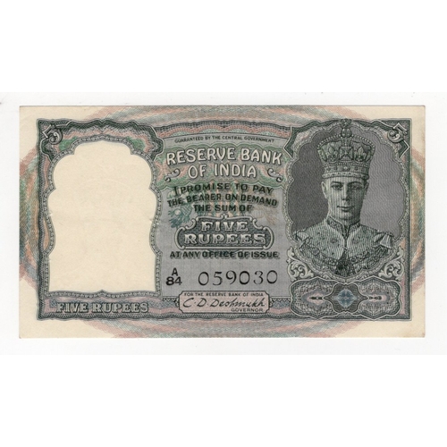 631 - India 5 Rupees issued 1943, signed C.D. Deshmukh, portrait King George VI at right, BLACK serial num... 